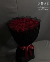 باقة ورد 50 وردة أحمر تغليف قماش