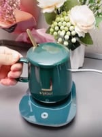 قاعده مع كوب يعمل بالكهرباء لحفظ الاشياء حاره