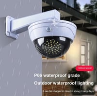 كاميرا وهمية مع اضاءة بالطاقة الشمسية