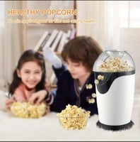 صانعة فيشار تعمل كهرباء 220 ا