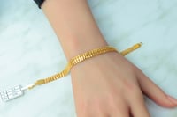 اسوارة ذهب عيار 21 تصميم غصن الزيتون بوزن 7 جرام