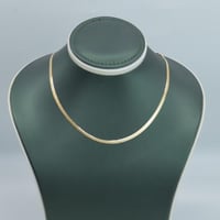 عقد ذهب فلات يلبس وجهين ( مطفي وسادة) عيار 18 وزن...