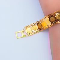 سوارة ذهب تصميم الجنيهات عيار 21 وزن 7.45 جرام