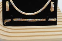 طقم ذهب الاوميقاء ايطالي عيار 18 وزن 20.06 جرام