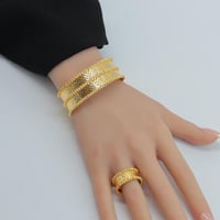 اسوارة دورين مع خاتم ذهب عيار 21 وزن 29 جرام