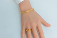 سوارة ذهب المونيكاء مع الخاتم عيار 21 وزن 12.8 جرا...