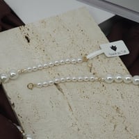 عقد مطعم بالؤلؤ الزراعي بتصميم الكرات الذهبية لأطل...