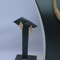 نصف طقم ذهب عيار 21 وزن 9 جرام