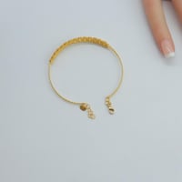 سوارة ذهب الدوريكاء مع الخاتم عيار 21 وزن 7.61 جرا...