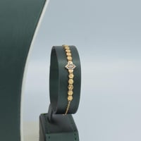 طقم ذهب جناح الصقر تصميم الماسي عيار 21 وزن 13.05...