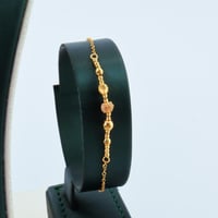 طقم ذهب تصميم كرات الدوريكاء عيار 21 وزن 7.10 جرام