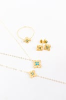 طقم ذهب روبرتو كوين باللون التيفاني عيار 18