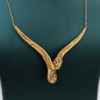 طقم ذهب تصميم غصن الزيتون عيار 21 وزن 8.11 جرام