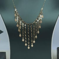 طقم ذهب تصميم السبيكة البيضاوي ناعم عيار 18 وزن 4....