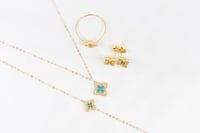 طقم ذهب روبرتو كوين باللون التيفاني عيار 18