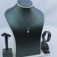 طقم ذهب عيار 18 بتصميم دمعة ألماسي وزن 4.5 جرام