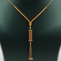 عقد ذهب عيار 21 تعليقة أسطوانية وزن 5.38 جرام بتصم...