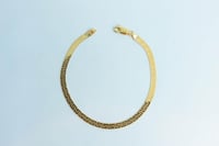 اسوارة ذهب ناعمه عيار 18 بتصميم فلات وزن 4.6 جرام