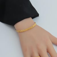 اسوارة مع خاتم ذهب عيار 21 بتصميم الدوريكاء وزن 7....