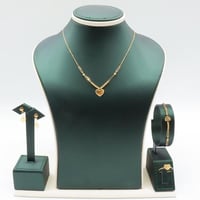 طقم ذهب صافي عيار 18 – تصميم قلب ناعم بوزن 5.47 جر...