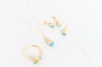 طقم ذهب مارلي نواعم بتصميم اللون التيفاني عيار 18...