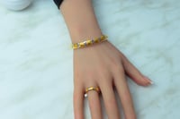 اسوارة مع خاتم ذهب عيار 21 بتصميم حصري انيق