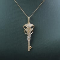 تعليقة ذهب عيار 18 مفتاح الألماس وزن 3.74 جرام