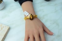 اسوارة ذهب عيار 21 بشكل بيضاوي بنقش فرزاتشي وزن 13...