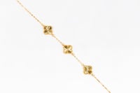 سوارة الفان كليف ثلاث وردات عيار 18 وزن 1.9 جرام