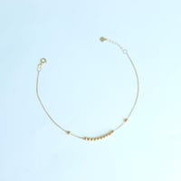 اسوارة ذهب عيار 18 بتصميم الببلز الانيق بوزن 0.5 ج...