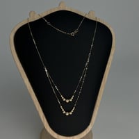 عقد ذهب الببلز دورين عيار 18 وزن 1.4 جرام