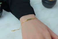 اسوارة ذهب عيار 18 صافية بوزن 2.3 جرام - لأناقة دا...