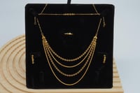 طقم ذهب اربعة دور عيار 21 وزن 11.1 جرام