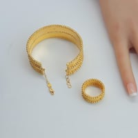 اسوارة دورين مع خاتم ذهب عيار 21 وزن 29 جرام