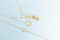 طقم ذهب اللوف عيار 21 دورين بتصميم الماس وزن 10.3...