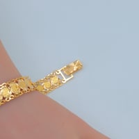 سوارة ذهب تصميم الجنيهات عيار 21 وزن 9.8 جرام