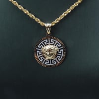 تعليقة مع سلسال ذهب عيار 18 فرزاتشي الدائري وزن 7...