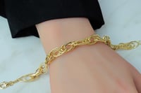 اسوارة ذهب جنزير ذو حلقات متداخلة عيار 18 وزن 6.3...