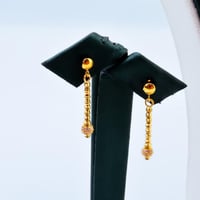 طقم ذهب تصميم كرات الدوريكاء عيار 21 وزن 7.10 جرام