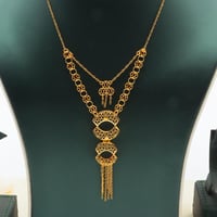 طقم ذهب عيار 21 وزن 10.63 جرام بتصميم متدرج وتعليق...