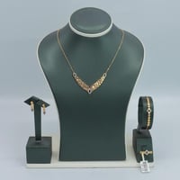 طقم ذهب عيار 21 تصميم جناح صقر الماسي وزن 13.03 جر...