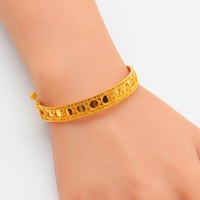 سوارة مع خاتم ذهب ديور عيار 21 وزن 19.66 جرام بتصم...