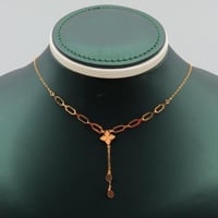 عقد ذهب عيار 21 بحلقات أنيقة وزن 0.9 جرام - تصميم...