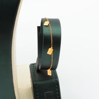 طقم ذهب ناعم عيار 21 وزن 3.48 جرام بتعليقة مستطيلة