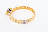 سوارة موناكو مع خاتم ذهب بلمسة الماسية عيار 18 بوز...