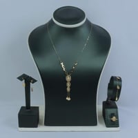 طقم ذهب تصميم السبيكة البيضاوي عيار 18 وزن 2.87 جر...