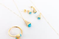 طقم ذهب مارلي نواعم بتصميم اللون التيفاني عيار 18...