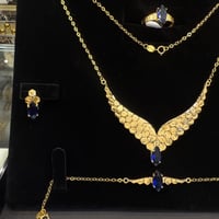 طقم جناح الصقر باللون الازرق عيار 21