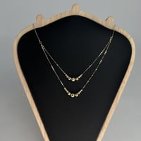 عقد ذهب الببلز دورين عيار 18 وزن 1.4 جرام