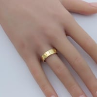 دبلة كارتير ذهب عيار 18 بتصميم اللوف العريض وزن 2....